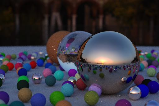 A mix of large and small spheres reflecting a sunset